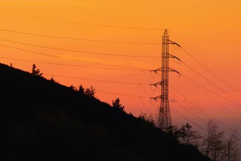 Transmission tower at sunset Stock Photos