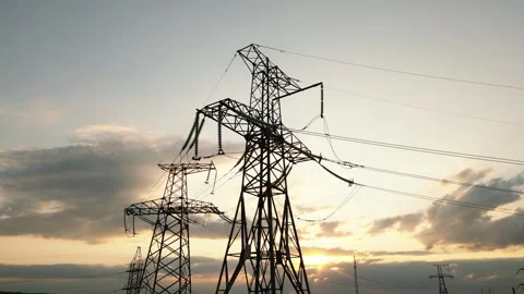 Transmission tower supporting an overhead high Stock Footage 249700091