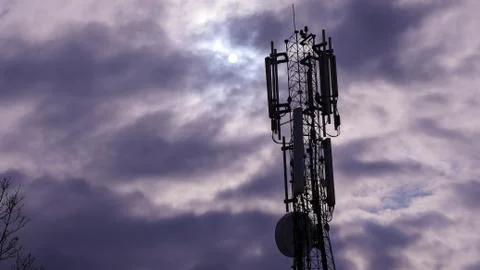 Transmitter tower with clouds in background Stock-Fotos