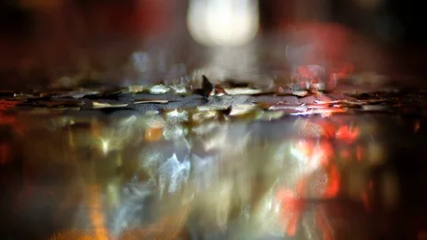 Transmitting Rays Of Light On The Table Decorated With Golden Stars. Stock-Footage 110755671