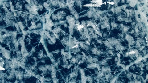 Transparent blue ice with cracks on Baikal lake in winter. Stock Footage 219957973