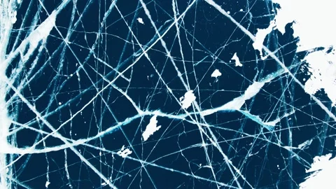 Transparent blue ice with cracks on Baikal lake in winter. Aerial top down view. Stock-Footage 253810355