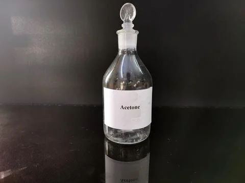 Transparent bottle filled with reagent solution 4 Stock Photos