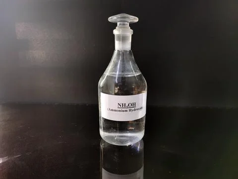 Transparent bottle filled with reagent solution 3 Stock Photos