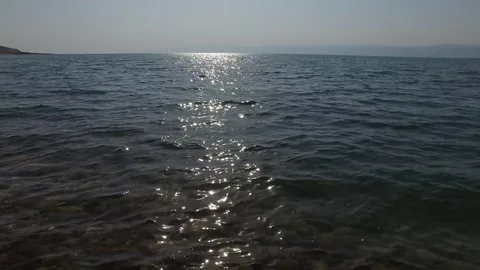 Transparent bottom of the dead sea. Sun rays on the water. Stock Footage 81687209