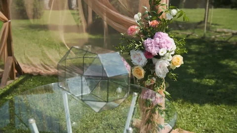 Transparent box for envelopes Wedding decor. Beautiful wedding arch with fresh Stock Footage 143251612