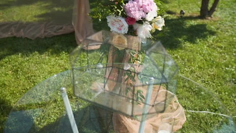 Transparent box for envelopes Wedding decor. Beautiful wedding arch with fresh Stock Footage 143251688