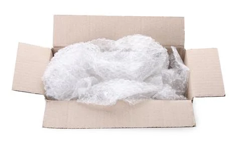 Transparent bubble wrap in cardboard box isolated on white Foto stock