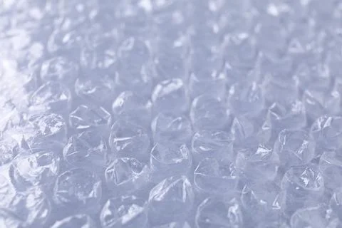 Transparent bubble wrap on gray background, closeup Foto stock
