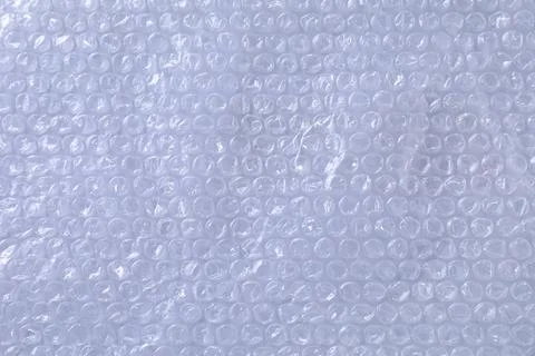 Transparent bubble wrap on gray background, top view Foto stock