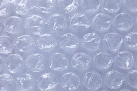 Transparent bubble wrap on gray background, top view Foto stock