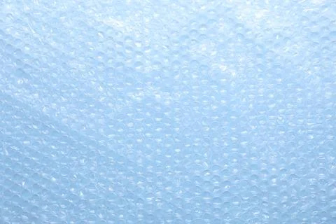 Transparent bubble wrap on light blue background, top view Foto stock