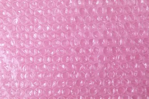 Transparent bubble wrap on pink background, top view Foto stock