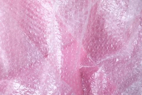 Transparent bubble wrap on pink background, top view Foto stock