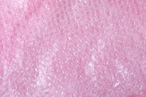 Transparent bubble wrap on pink background, top view Foto stock