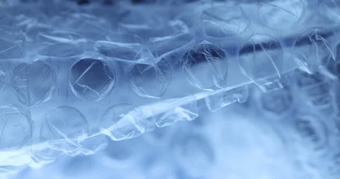 Transparent Bubble Wrap Texture in Blue light Stock Footage 313261104