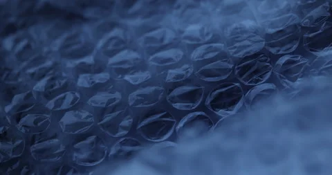 Transparent Bubble Wrap Texture in Blue light Stock Footage 313261134
