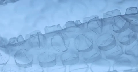 Transparent Bubble Wrap Texture in Blue light Stock Footage 313261139