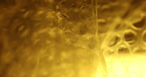 Transparent Bubble Wrap Texture Yellow light Stock Footage 313261889