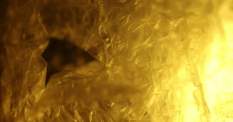 Transparent Bubble Wrap Texture Yellow light Stock Footage 313263915