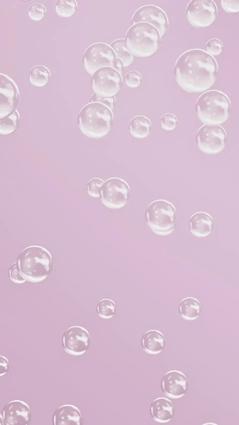 Transparent Bubbles Floating on Pastel Pink Vertical Seamless Loop Vídeo Stock 345852899