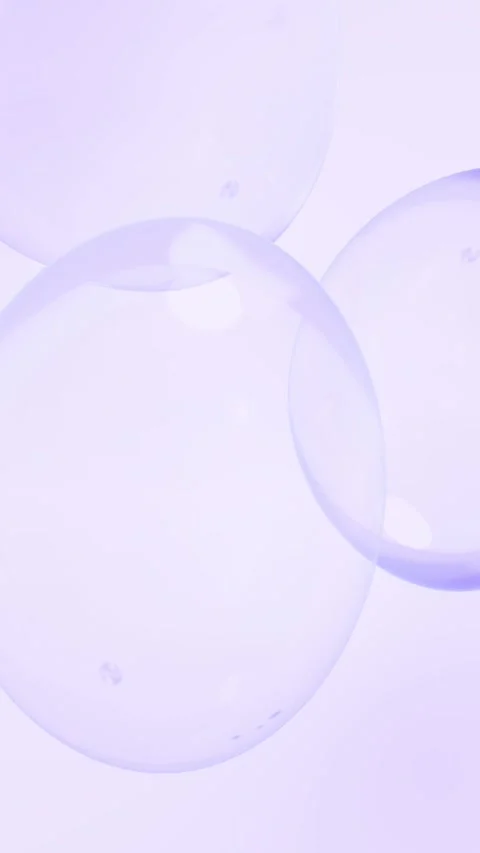 Transparent bubbles floating on soft light background – seamless loop Stock Footage 318095913