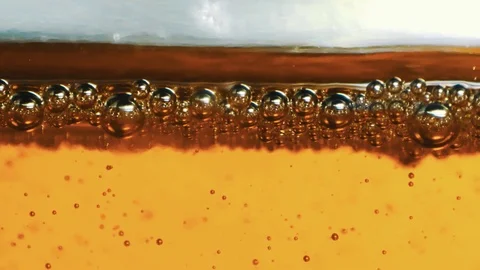 Transparent bubbles in a Liquid - macro video Stock-Footage 125531032