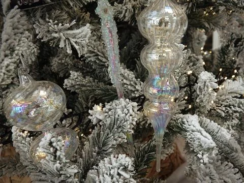 Transparent Christmas decorations in a tree 库存照片