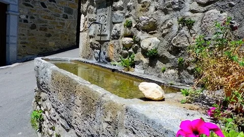 Transparent clean drinking water flows from street fountain Stock Footage 112190046