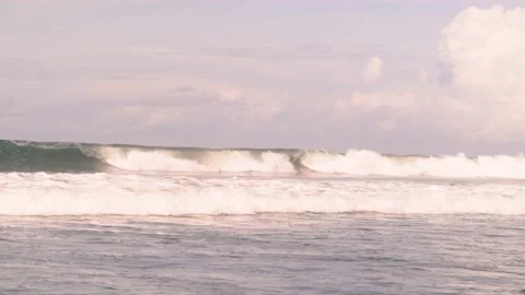 Transparent clean surfing ocean waves roll and breaking onto beach. Summer  Video stock 184513286