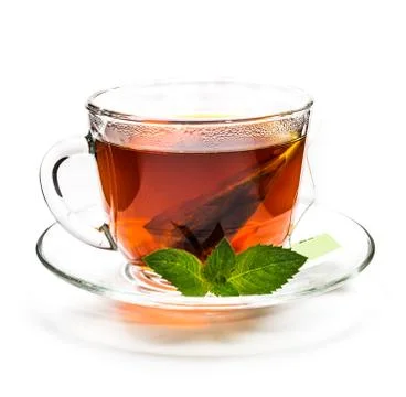 Transparent cup of tea and mint leaves on white Stock Photos