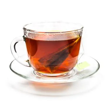 Transparent cup of tea with tea bag on white Stock Photos