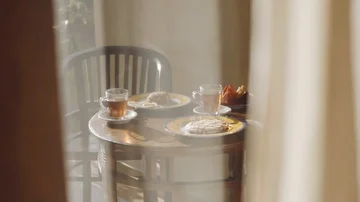 Transparent cups of hot black tea and breakfast with pancake and fried rice on 動画素材 85718369