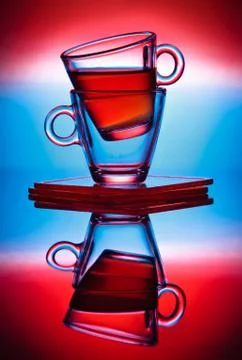 Transparent  cups with reflection. Stock Photos