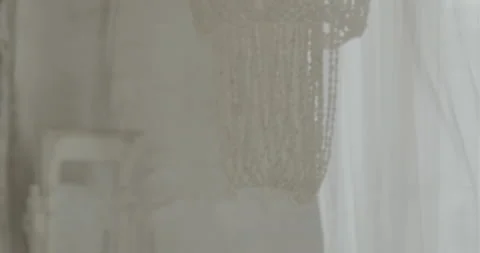 Transparent curtain on the window, gently moved by the wind in the living room Stock-Footage 157737993