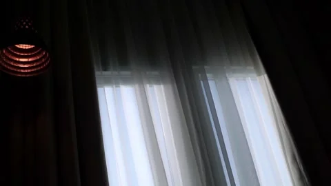 Transparent curtain on the window, gently moved by the wind. Stock Footage 205426151