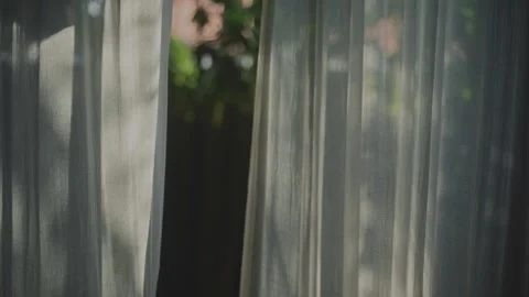 Transparent curtain on the window, gently moved by the wind. 스톡 동영상 246488295