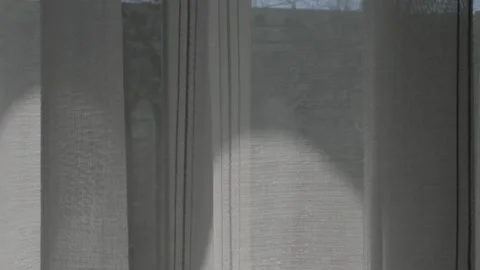 Transparent curtains with stripes on the window Stock Footage 182423843