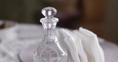 Transparent decanter with vodka on the table Stock Footage 147483991