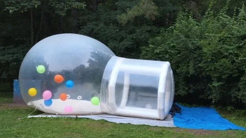 Transparent dome-like structure mimicking oversized candy dispenser Stock Footage 341748963