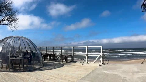Transparent domes protecting cafe visitors from cold and wind Video stock 183468326