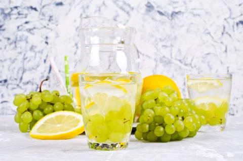 Transparent drink with fruit Stock Photos