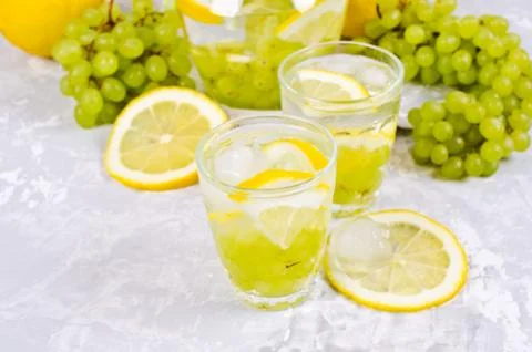 Transparent drink with fruit Stock Photos