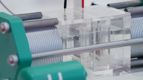 Transparent electrolysis stack with visible reactor chambers and metallic cell Stock Footage 335312457