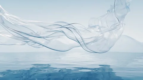 Transparent fabric flowing dynamically over serene water surface 스톡 동영상 327343104