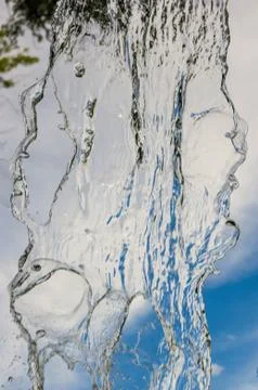 Transparent falling water vertical flows, close up Stock Photos