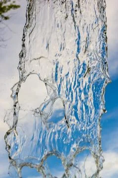 Transparent falling water vertical flows, close up Stock Photos