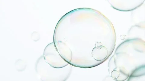 Transparent floating soap bubbles isolated on white background with soft Foto stock