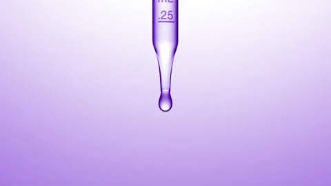 Transparent fluid is dripped from graduated lab dropper Stock Footage 171890628