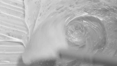 Transparent gel serum texture spreading footage. Hyaluronic acid with bubble Stock Footage 197901333